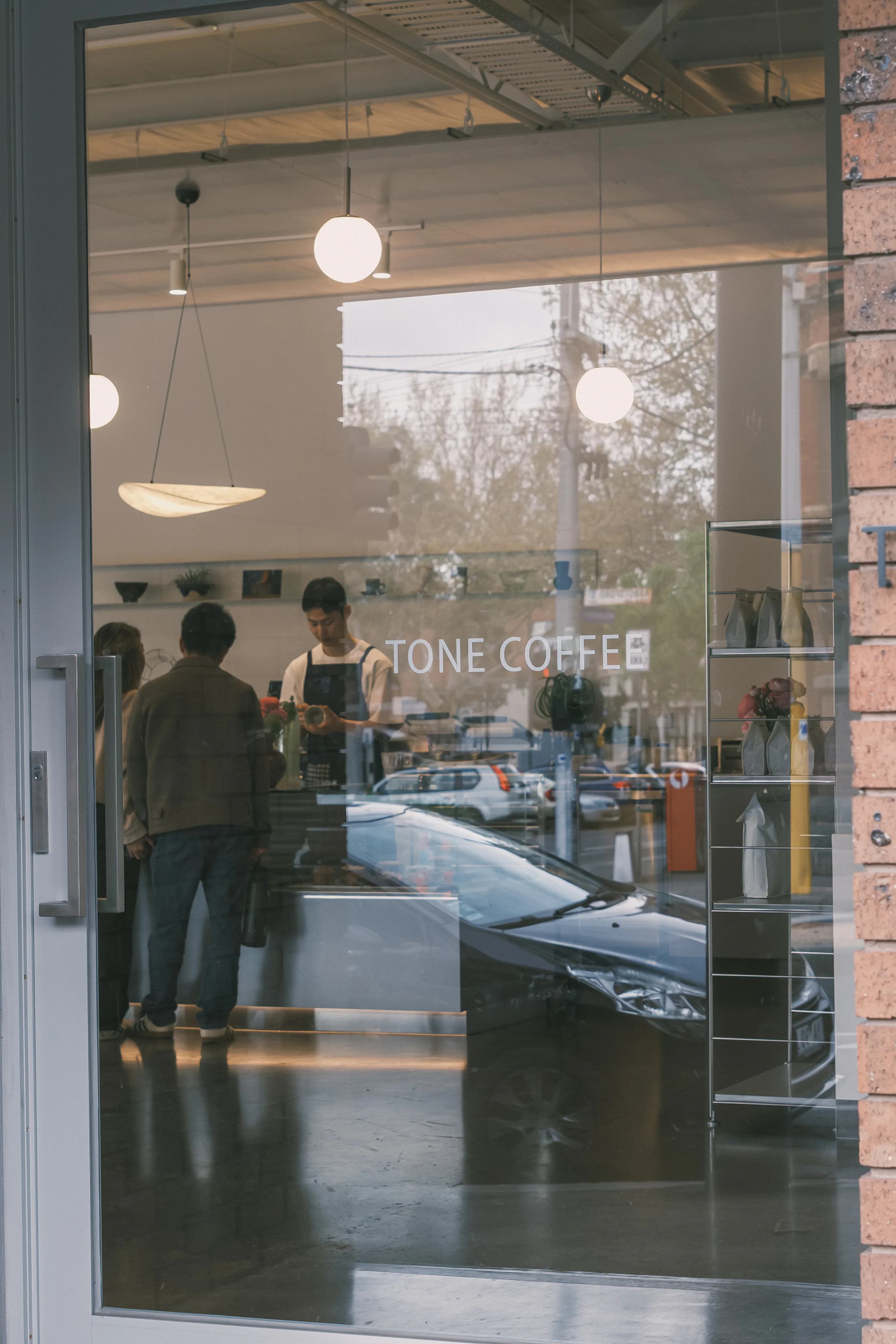 Tone Coffee Roasters interior and coffee preparation